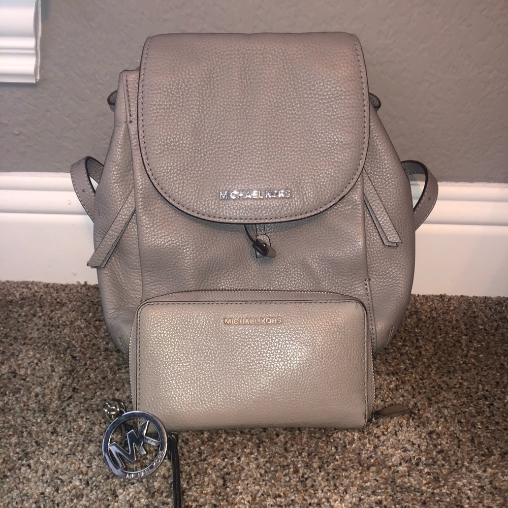 Michael Kors wallet, keychain, backpack